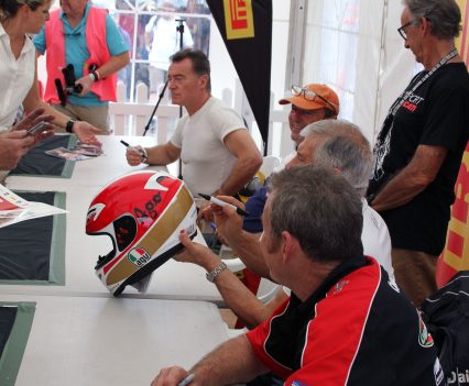 2017 International Festival of Speed - Agostini signing a helmet