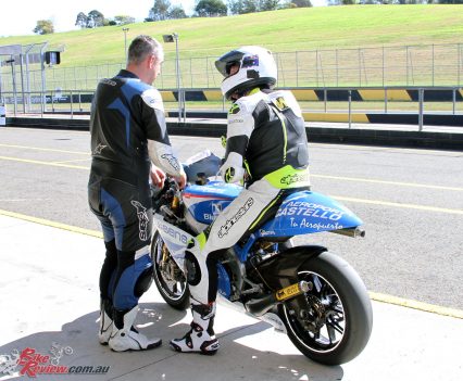 Warming up the Aprilia RSW250 GP machine at Eastern Creek