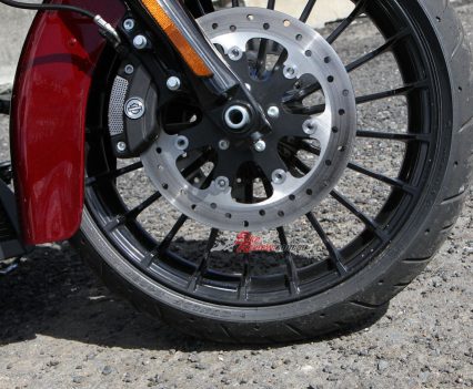 Dual 320mm rotors adorn the Road King with four-piston calipers featuring 32mm pistons