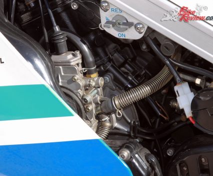 Suzuki's RG500 is powered by the liquid cooled square-four two-stroke with a Mikuni flatslide for each cylinder