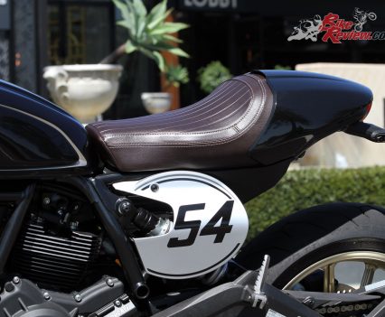 The numbered race plates are a nice touch, on a largely blacked out bike