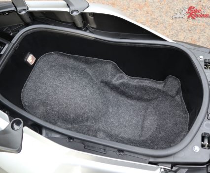 Underseat storage on the TMax SX is extremely generous, with room for a full face and extras, or two half face helmts