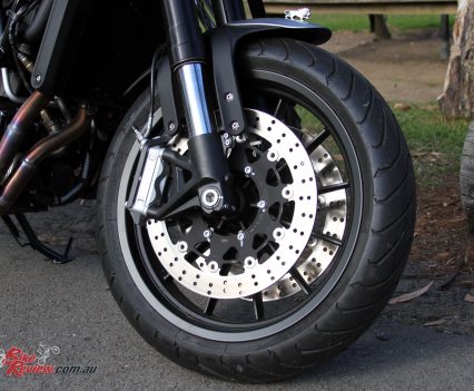 Dual 320mm rotors with four-piston calipers are impressive for the category