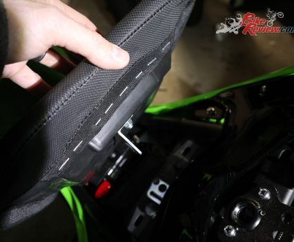 The rider seat once released comes up and backwards