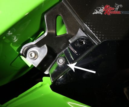 A pull pin hidden under the section you just removed