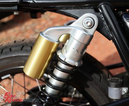 Twin rear shocks with remote reservoir.