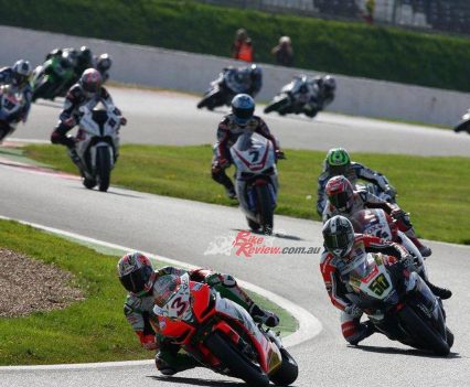 BikeReview_AlitaliaRSV4Aprilia_Biaggi_Warelr World champion Max Biaggi leads the action in Magny Cours