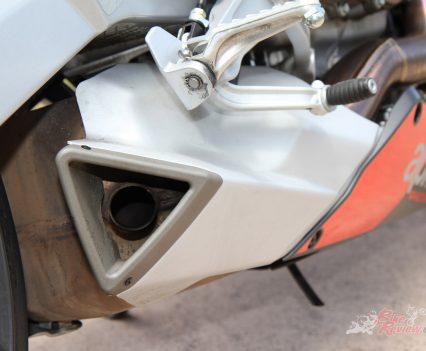 Lack of heel guards drove me insane. My boots rubbed on the swingarm constantly. Bizzare design...