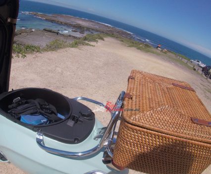 Plenty of underseat storage, enough for an open face lid.