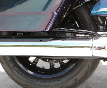 300mm rotor, four-piston caliper, linked brakes (front activates rear)