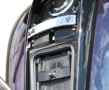 Fuel filler cap is under the phone cover.