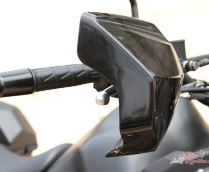 Brush and wind protection.