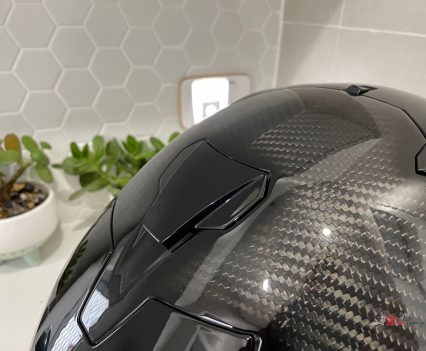 Visible carbon-fibre when the sun hits.