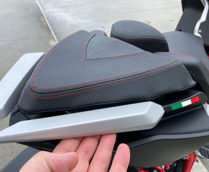 You can only get your fingertips under the grab rails.