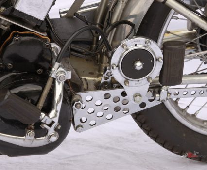 Drilled heel guards reduce weight.