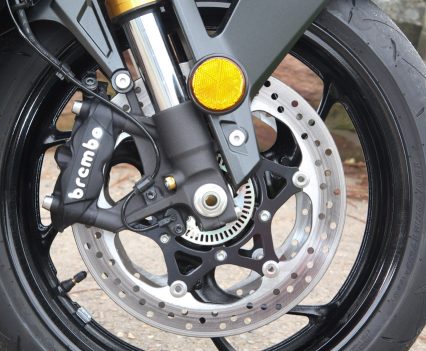 Four-piston Brembo mono-block calipers, 310mm floating-mount dual rotors.