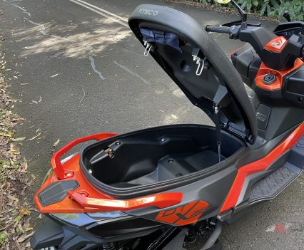 Under-seat space isn't anything special, maybe opt for an open face if you're planning on storing your lid under the seat.