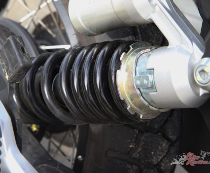 Double-sided swingarm with monoshock adjustable for preload and rebound.