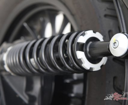 Dual swingarm with two adjustable shocks for spring preload.