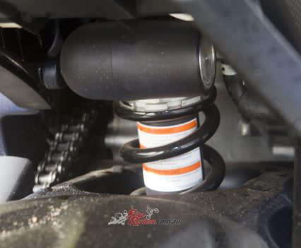 Showa monoshock, fully adjustable, 130mm travel.