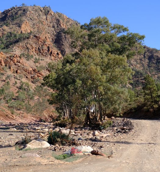 Creek beds are usually dry, and if they flood and destroy the tracks, these are graded again quite quickly.