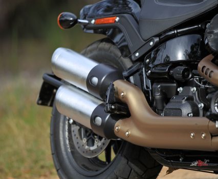 Bronze covers on the pipes, standing out amongst the black colour scheme.