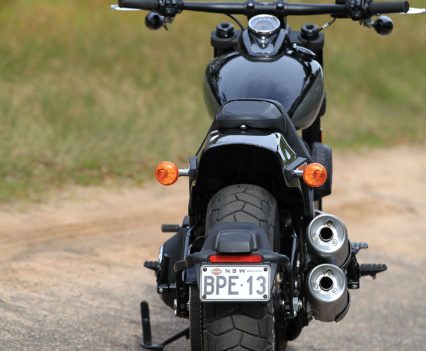 Helping the 306kg machine get off the side stand.