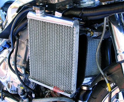 Side mounted radiators due to intercooler position.