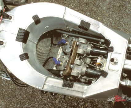 36mm Mikuni dual-body twin-choke with electronic powerjet.
