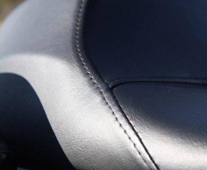 Just a single saddle for the ST. The Street Glide Special has a pillion seat.