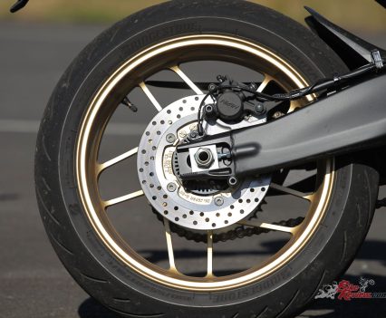 Single 245mm disc with single-piston caliper, cornering ABS.