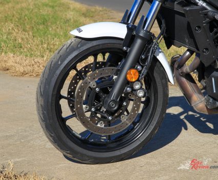 Dual hydraulic four-piston calipers with 298mm discs; ABS.