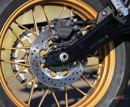 Single-piston Nissin caliper with 220mm disc.