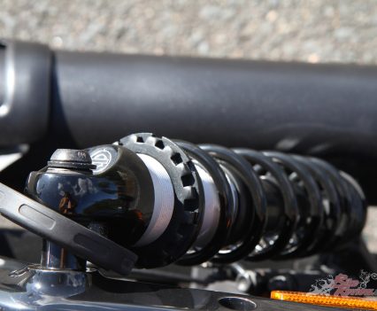 Dual outboard, direct-acting (no linkage) emulsion technology shock absorbers with coil springs and a threaded collar for pre-load adjustment.