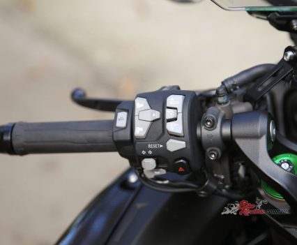 Cruise control is set via one of the man buttons on the left side of the 'bars.