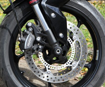 Nissin two-piston sliding calipers, twin 310mm discs.