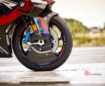 M Aero Wheel Covers made from visible carbon fibre.