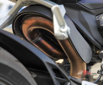 Exhaust that loops under the seat.