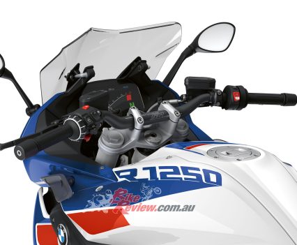 Controlled via the buttons on the handlebars.