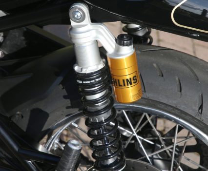 Öhlins twin shocks with remote reservoir – fully adjustable.