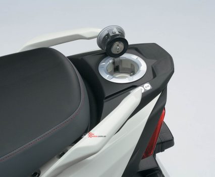 Hinged, rear-mounted fuel filler.