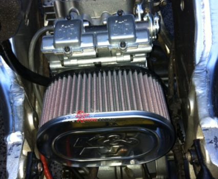 Twin Keihin FCR 35mm carburetors.