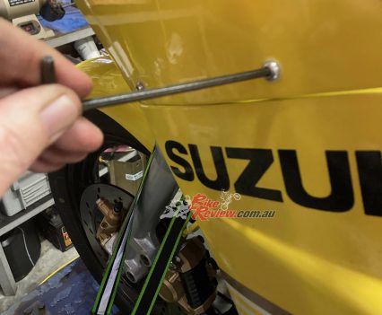 Fitting the freshly painted fairing.