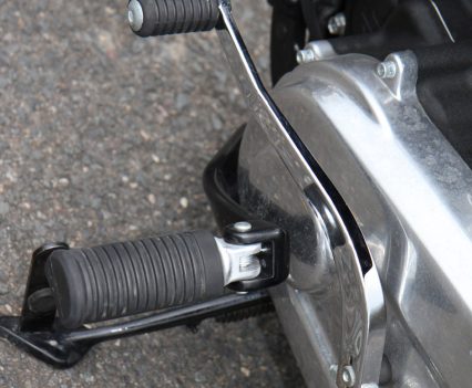 Forward positioned 'pegs.