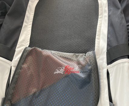 It completely opens at the front and the back.