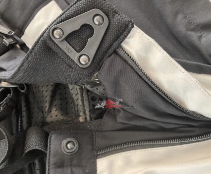 The waist fastener can be a bit stiff.