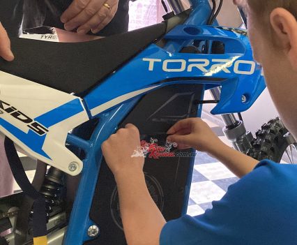 Ant fitting some BikeReview stickers.