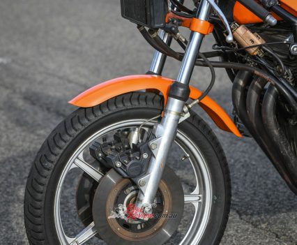 38mm Ceriani telescopic fork adjustable for spring preload and rebound damping.