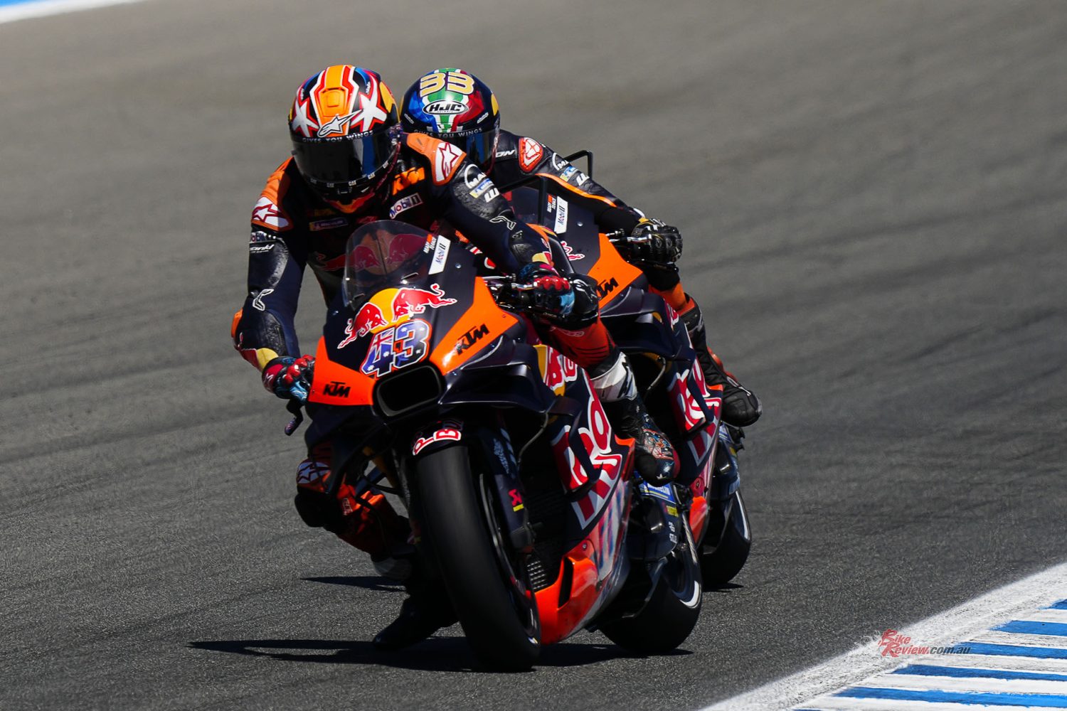 Miller and Binder were ragged perfection in the lead though, sliding their way around Jerez circuit in a two-man show for a few laps.