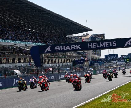 The grid formed in front of the biggest crowd MotoGP has ever seen and it was Marc Marquez who shot into the lead as Bagnaia dropped down the order to P5.